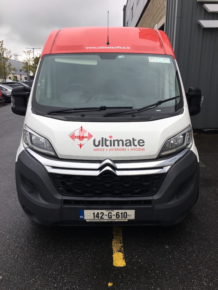 A branded van with custom vinyl - an example of a vehicle wrap